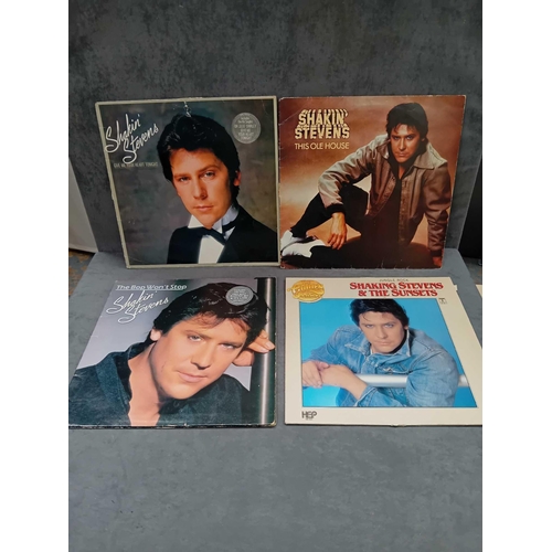 389 - 9 x Shakin Stevens vinyls as pictured