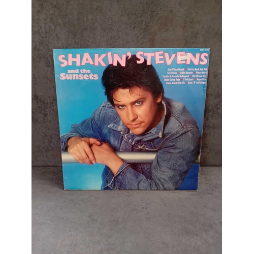 389 - 9 x Shakin Stevens vinyls as pictured