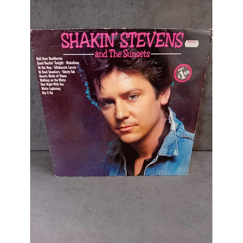 389 - 9 x Shakin Stevens vinyls as pictured