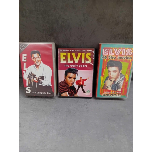 412 - 3 x Elvis collectibles    1 x Elvis the complete story VHS   1 x Elvis at the movies VHS    1 x Elvi... 