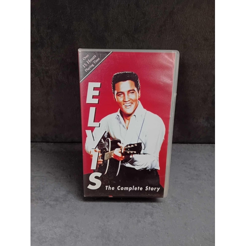 412 - 3 x Elvis collectibles    1 x Elvis the complete story VHS   1 x Elvis at the movies VHS    1 x Elvi... 