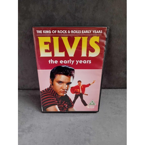 412 - 3 x Elvis collectibles    1 x Elvis the complete story VHS   1 x Elvis at the movies VHS    1 x Elvi... 