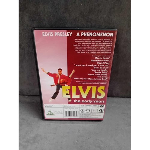 412 - 3 x Elvis collectibles    1 x Elvis the complete story VHS   1 x Elvis at the movies VHS    1 x Elvi... 