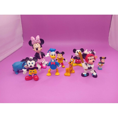 324 - Large collection of disney items including Disney land Paris stamps rare Goofy figure hand painted b... 