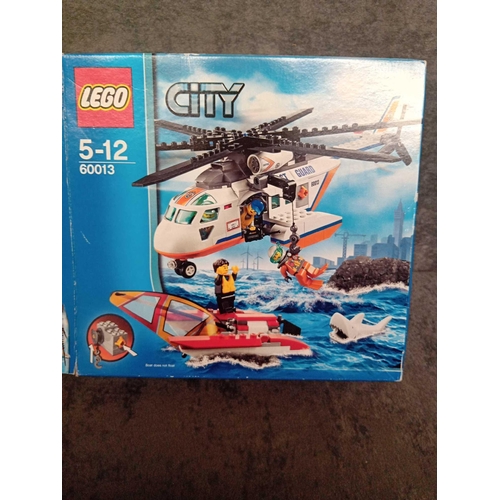 523 - Lego City Coast guard set 60013 including box and instruction manual boat missing sail