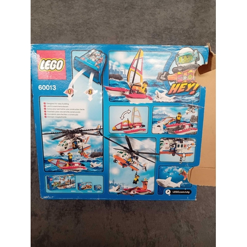 523 - Lego City Coast guard set 60013 including box and instruction manual boat missing sail