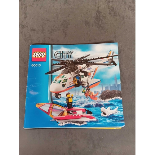 523 - Lego City Coast guard set 60013 including box and instruction manual boat missing sail