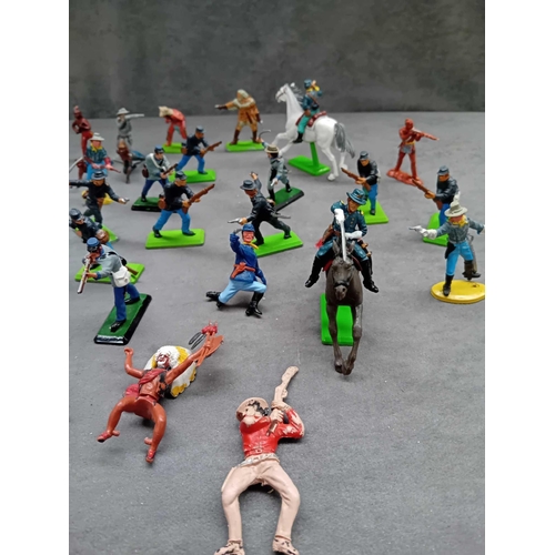 566 - Lot of 38 miniature figures comprising of plastic and metal soldiers made by Britain's ltd