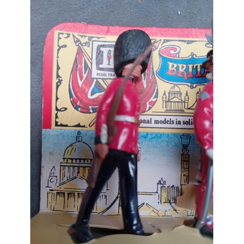 572 - Britains Ltd 3x tin soldiers Queens guard