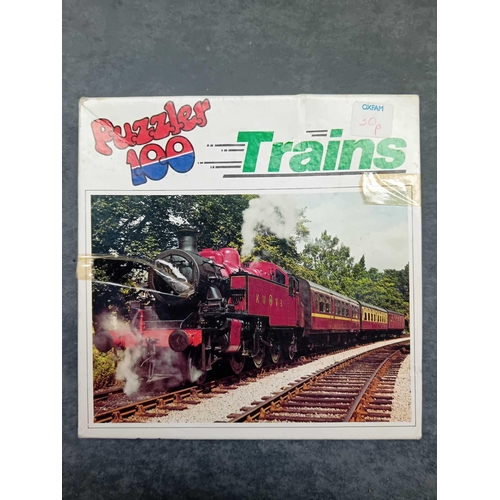 609 - 5 x transport themed puzzles    4 x trains    1 x boats