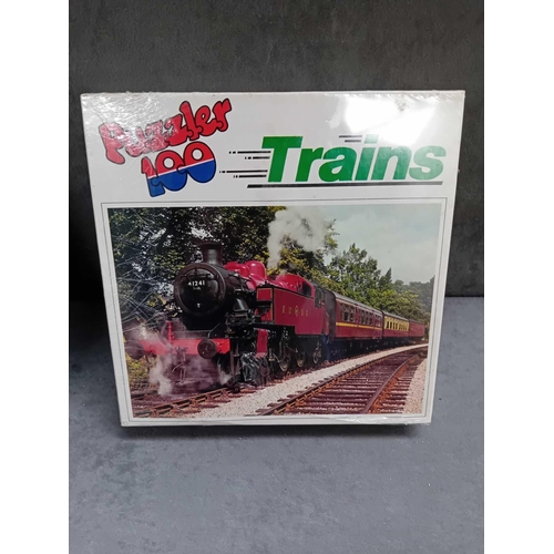 609 - 5 x transport themed puzzles    4 x trains    1 x boats