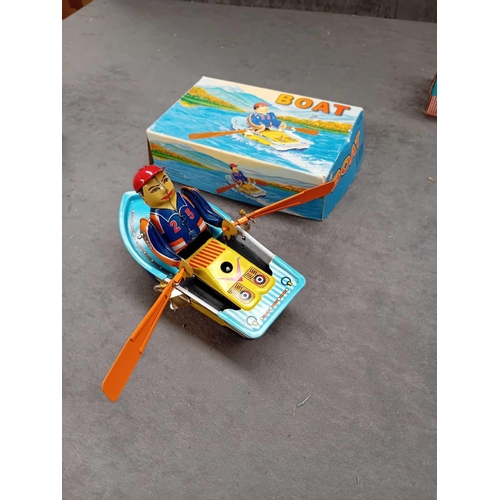 618 - 2 x tin toy boats