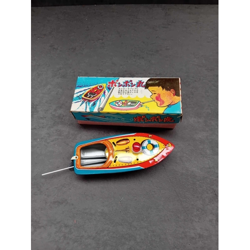 618 - 2 x tin toy boats