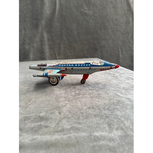 65 - Tin Toy MF-105 jet