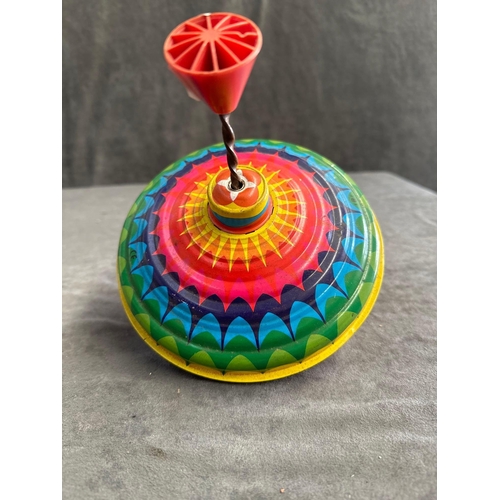 71 - 2 Tin Toy spin tops