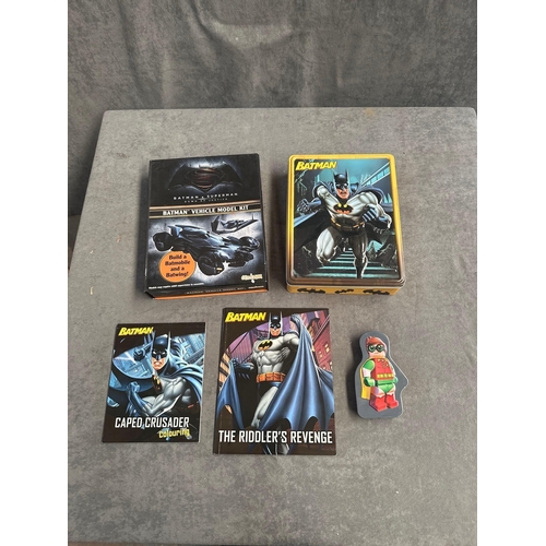 74 - Selection of Batman items 1 small tin 1 large tin 1 book 1 colouring book unused and 1 model kit