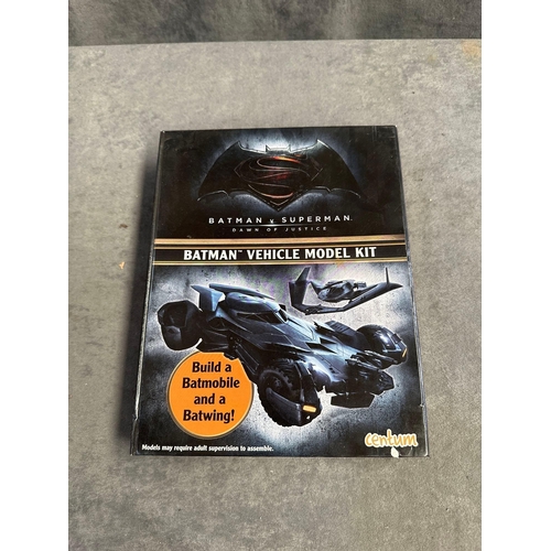 74 - Selection of Batman items 1 small tin 1 large tin 1 book 1 colouring book unused and 1 model kit