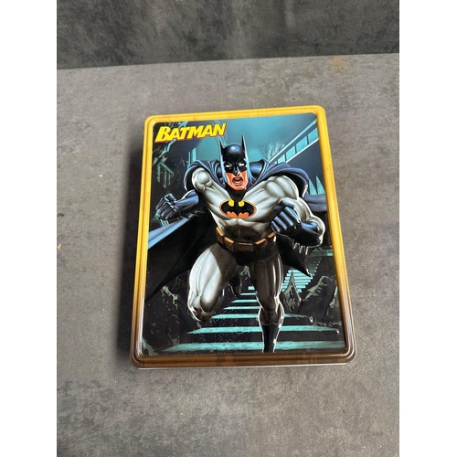 74 - Selection of Batman items 1 small tin 1 large tin 1 book 1 colouring book unused and 1 model kit