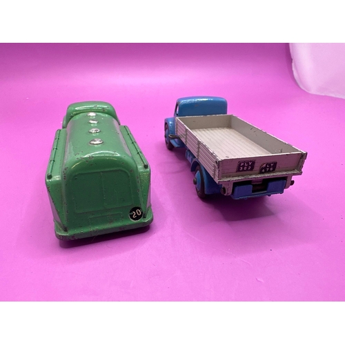 306 - 2 Dinky Toys Unboxed Petrol Truck In Green And Dodge Tipper Lorry 414 In Blue And Grey.