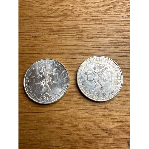 696 - Pair Of Mexico 1968 Olympic Silver 25 Peso Coins. This Lot Includes Paper Clipping. 72% Silver 28% C... 