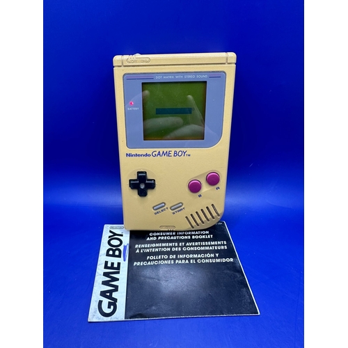 29 - Original GameBoy in Gold Model DMG - 01