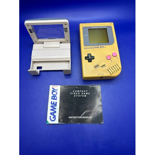 30 - Original GameBoy in Gold Model DMG - 01 Comes With Light Magic Magnifing Glass.