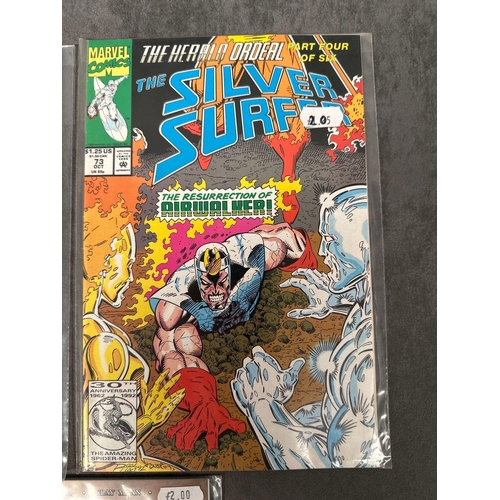 97 - 3. Issues of Marvel comics, two times silver surfer and one fantastic four