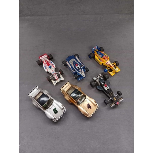 314 - Large selection of Scalextric containing 6 cars, 2 controls, 41 track pieces and 27 barriers as pict... 