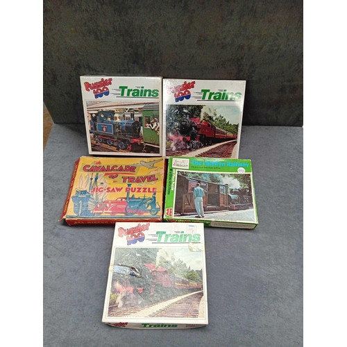 28 - 5 x transport themed puzzles 4 x trains 1 x boats