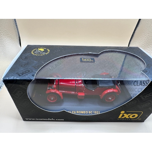 An IXO MODELS 1:43 scale die-cast model car, identified on its ...