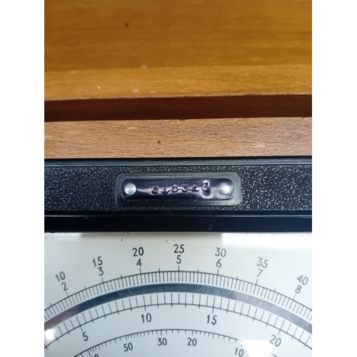 33 - A vintage Windsor Universal Meter, Model 88A, presented in a hinged, lacquered wooden carrying case ... 