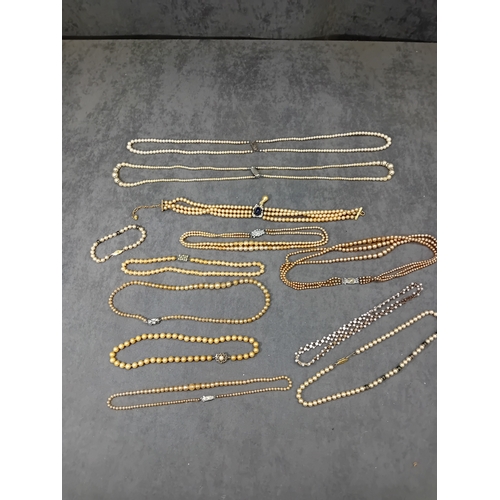 118 - Mixed lot of dress Jewelry, Peal designs with pretty center jewels as pictured.&nbsp;