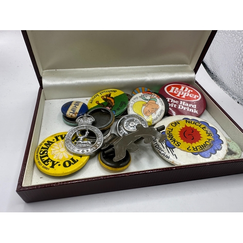 143 - A collection of 20 assorted vintage pins and badges, predominantly mid-20th century tin-plate and en... 