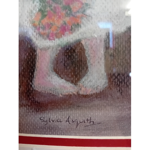 152 - A framed pastel or chalk drawing by Sylvia Asquith, depicting a young girl in a pink hat and white d... 