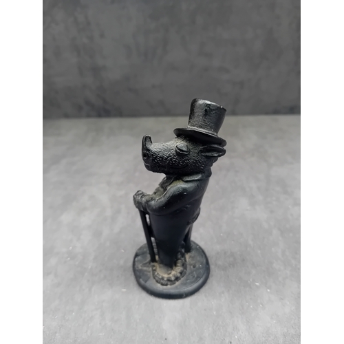 219 - A figurine by 'Crafty with Coal', crafted from Welsh coal. The piece depicts an anthropomorphic pig ... 