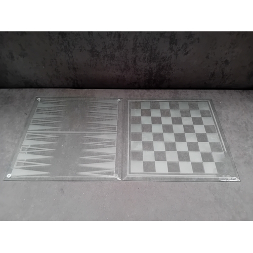 235 - This lot comprises two distinct modern game boards, each constructed from clear glass with frosted e... 