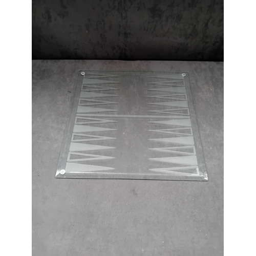 235 - This lot comprises two distinct modern game boards, each constructed from clear glass with frosted e... 