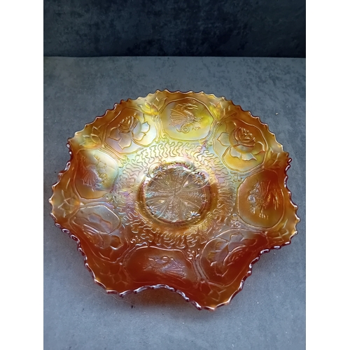 250 - A pair of Fenton Marigold Carnival Glass bowls, comprising one in the Dragon & Lotus pattern and... 