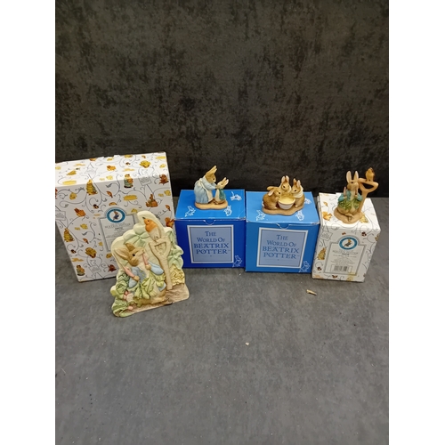 260 - A collection of four 'The World of Beatrix Potter' figurines by Border Fine Arts, each presented wit... 
