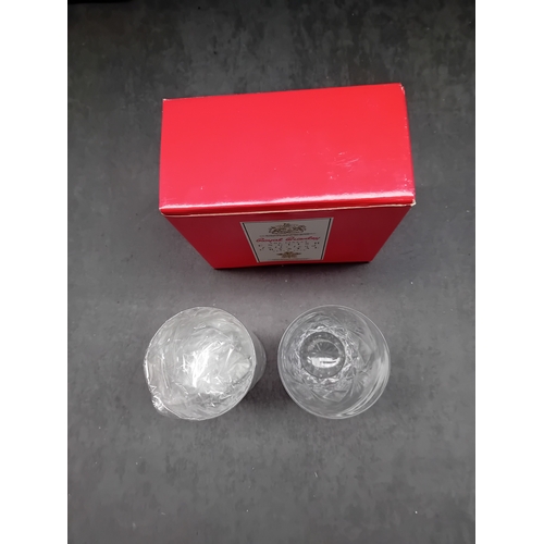 270 - A pair of Royal Brierley Led Crystal Tumblers, each featuring an intricate pattern of intersecting c... 