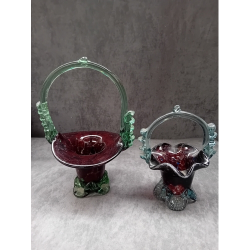 292 - Mixed lot of 2 End of Day Glass Baskets as Pictured 
 
 

  Sizes 
 

  22cm Tall 
 

  16cm Tall 
... 