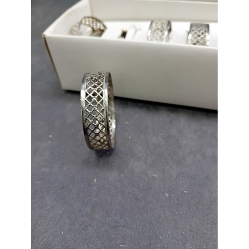 437 - A set of six vintage FLORANTAL silver-plated napkin rings. Each ring is crafted from a silver-toned ... 
