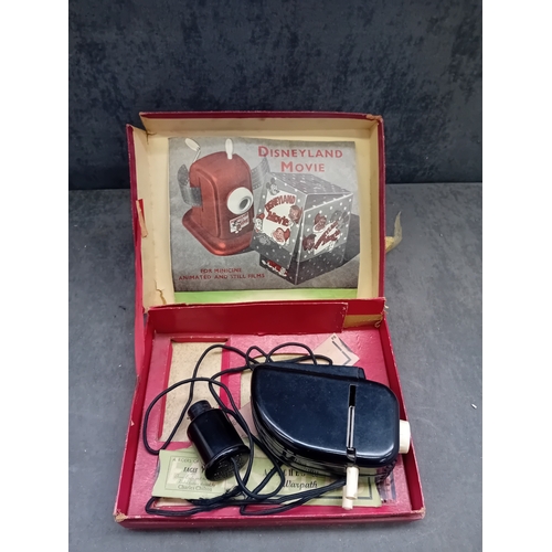 575 - A vintage Merit S.E.L. Ace 'EAGLE' film projector, likely dating from the mid-20th century. The proj... 