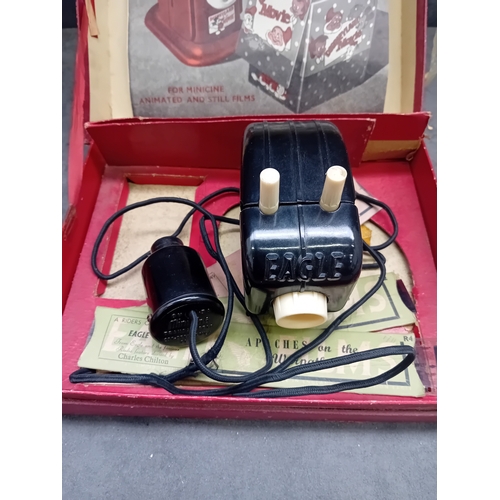 575 - A vintage Merit S.E.L. Ace 'EAGLE' film projector, likely dating from the mid-20th century. The proj... 