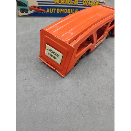 585 - A vintage Y4935 SSS tin friction automobile carrier truck and trailer set, manufactured in Japan. Th... 