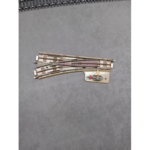 604 - A collection of Hornby and Peco HO/OO gauge model railway track sections, comprising various straigh... 