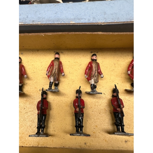 657 - ER Royal set includes queens guards and horse and carriage. made by John Hill Co Metal Toys.&nbsp;