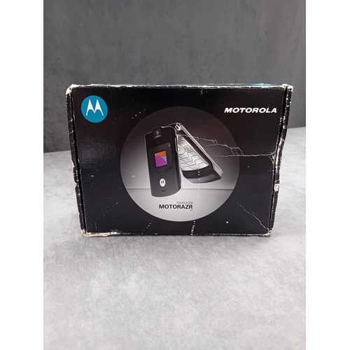102 - Motorola Razr V3 complete in original box as pictured