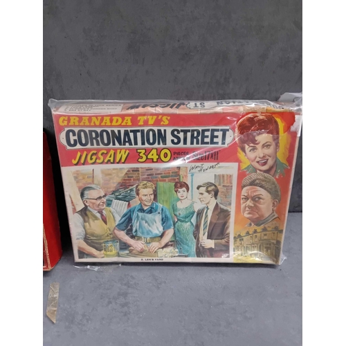 150 - 7 x puzzles 1 x zig zag puzzle record breakers 1 x Granada tvs Coronation street 1 x Britain's herit... 