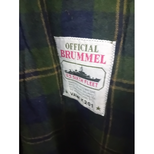 18 - A navy blue duffle coat, likely constructed from a wool or wool-blend fabric, featuring a hood with ... 